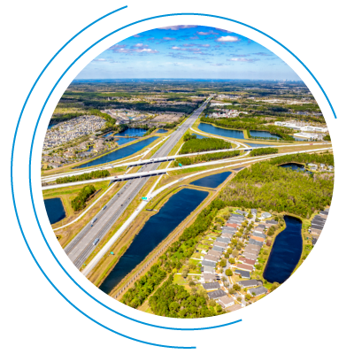 Aerial view of one of Florida’s major highway systems weaving through the landscape Aerial view of one of Florida’s major highway systems weaving through the landscape