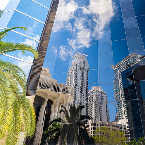 reflection of buildings in a skyscraper reflection of buildings in a skyscraper